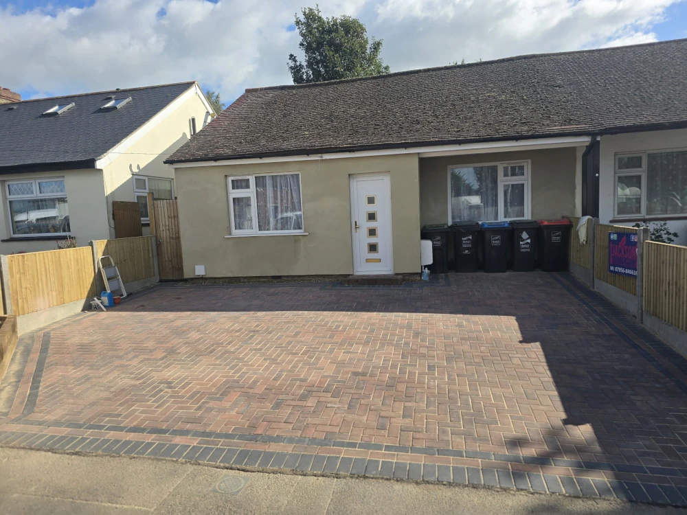 Elegant Brick Driveway Designed by Jackson Landscaping