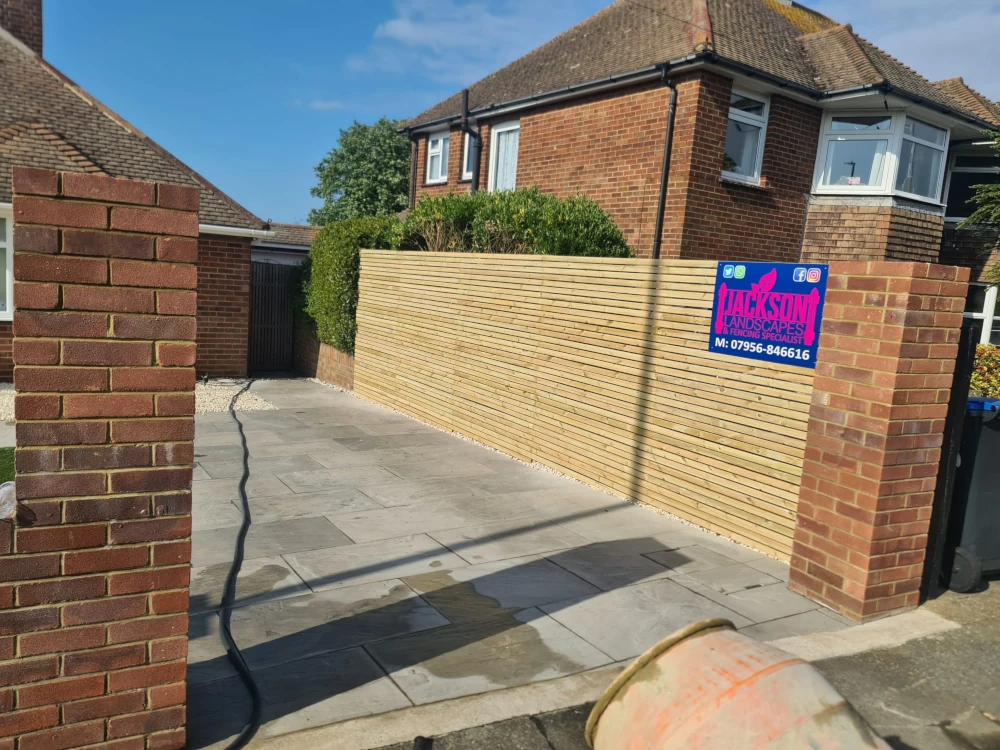 High-quality six-foot wooden fencing created and installed by Jackson Landscaping