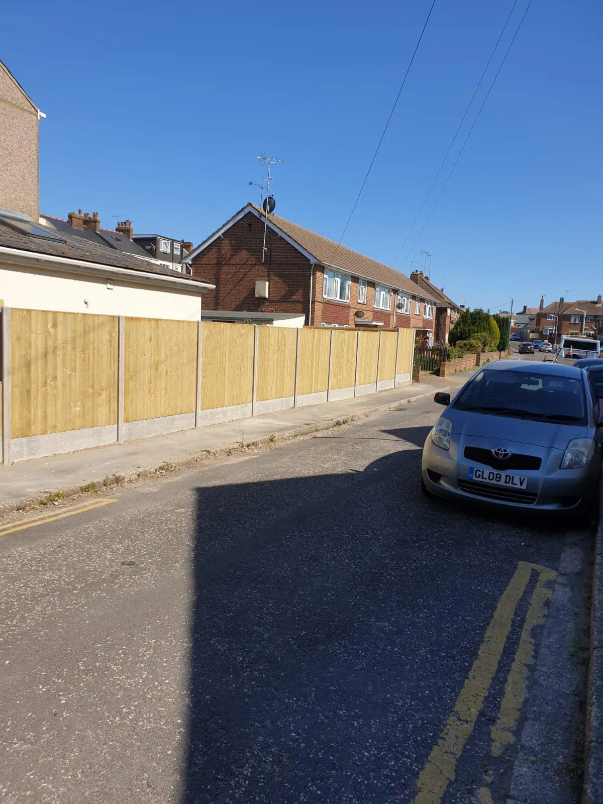 Classic wooden panel fence expertly built by Jackson Landscaping